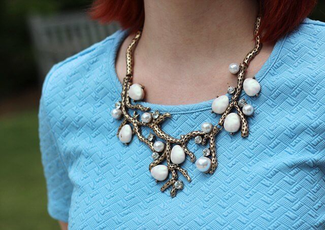 Don't: Add a Statement Necklace to Your Outfit