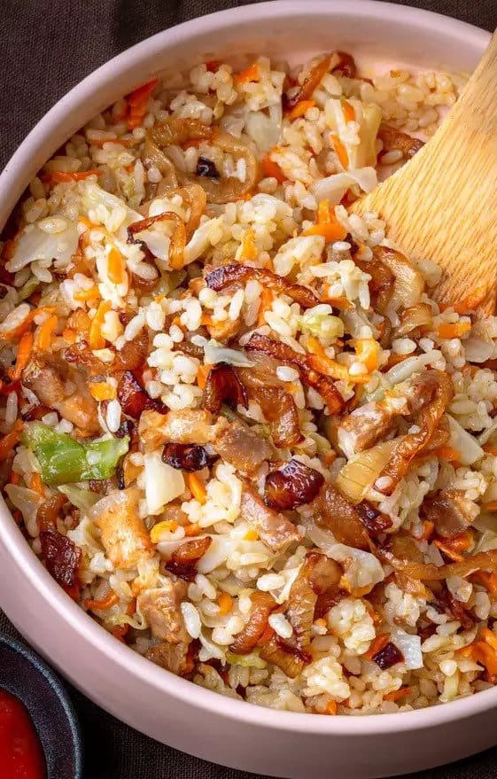 Bowl of food made of rice and vegetables