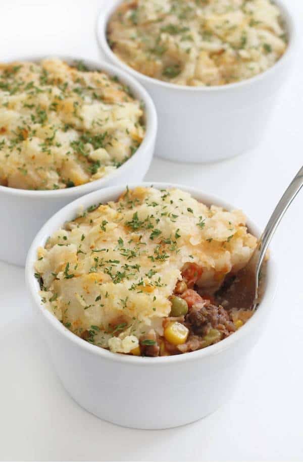 Served Lentil Shepherd's Pie in three small containers