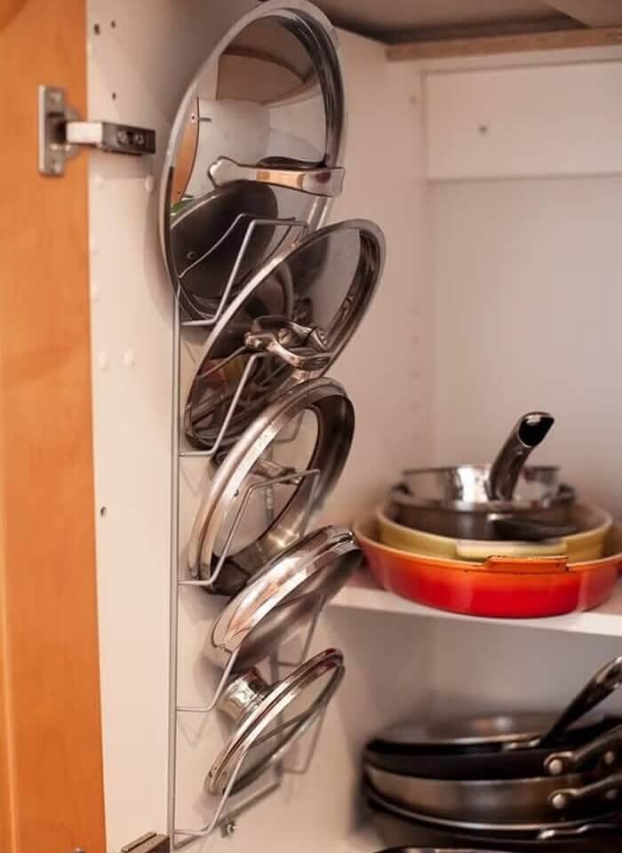 Keep Track Of Pot Lids With A Magazine Holder