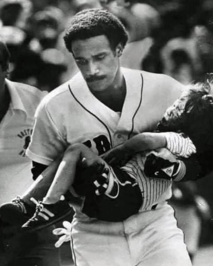 Jim Rice Carries a Boy Hit in the Face by a Foul Ball