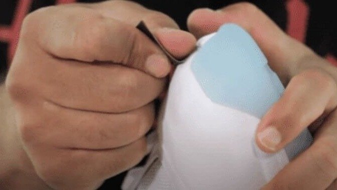 Rub Sandpaper on the Soles of Your Shoes for Better Grip